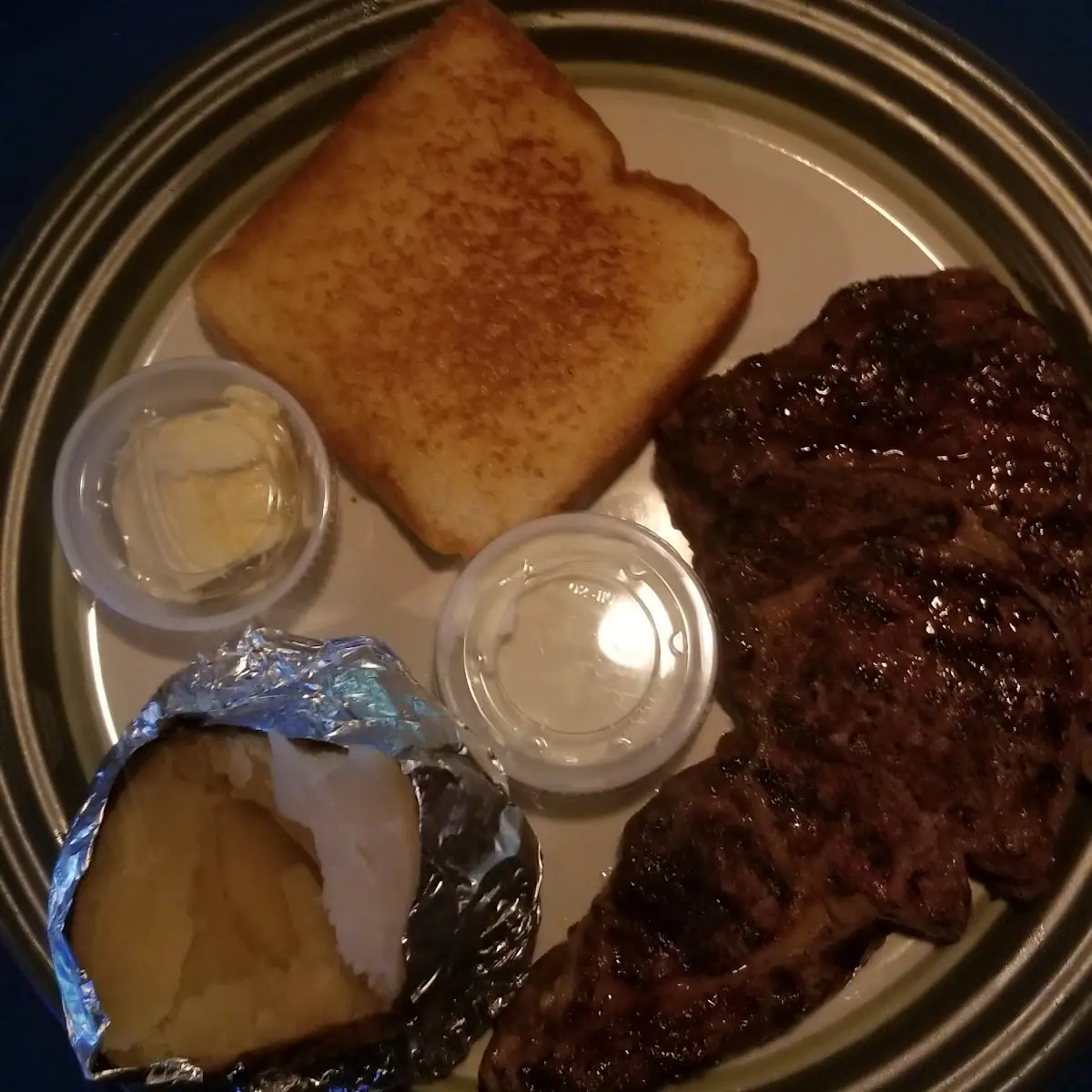 12 Oz Rib Eye Steak with Baked Potato