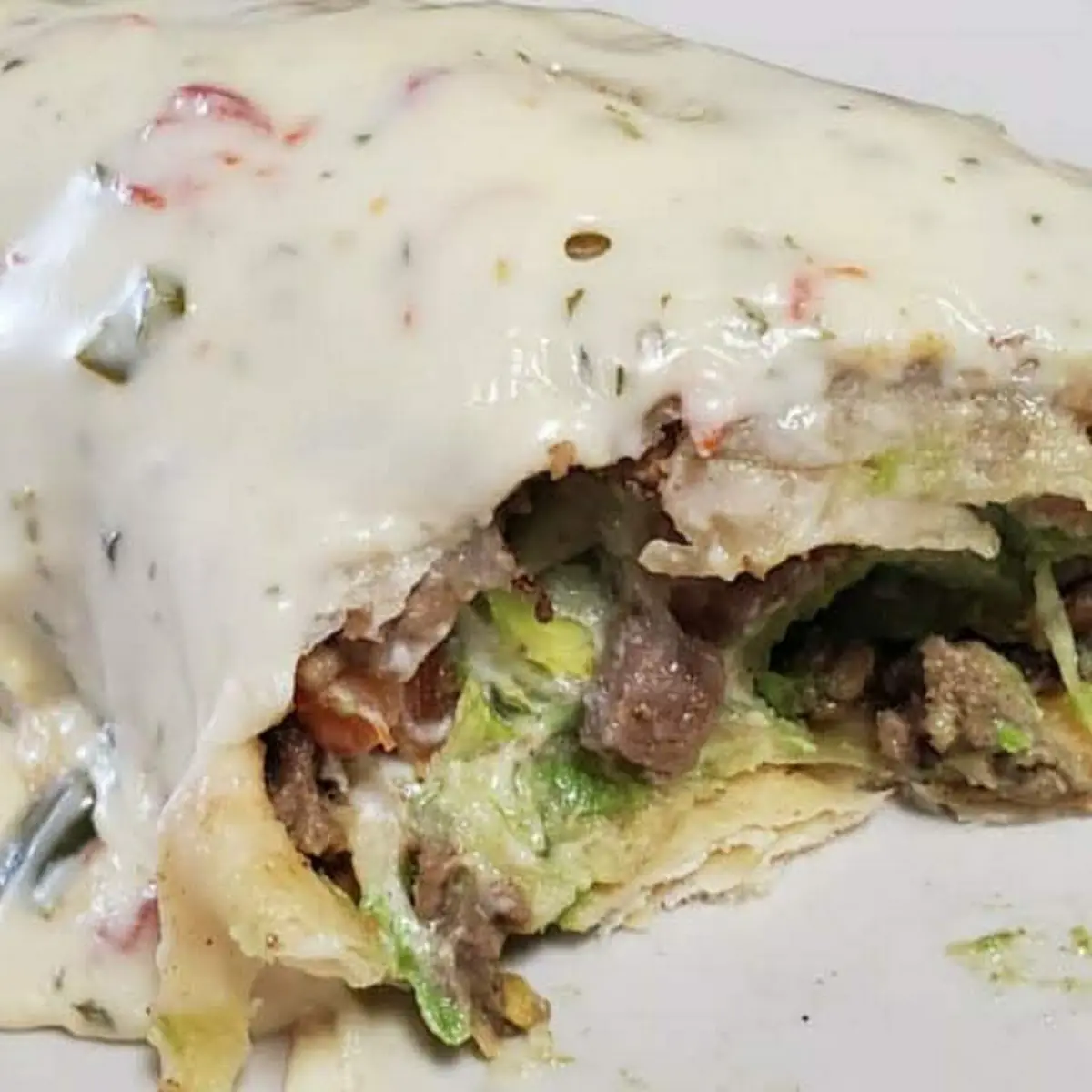Suizo Burrito with Melted Cheese on Top