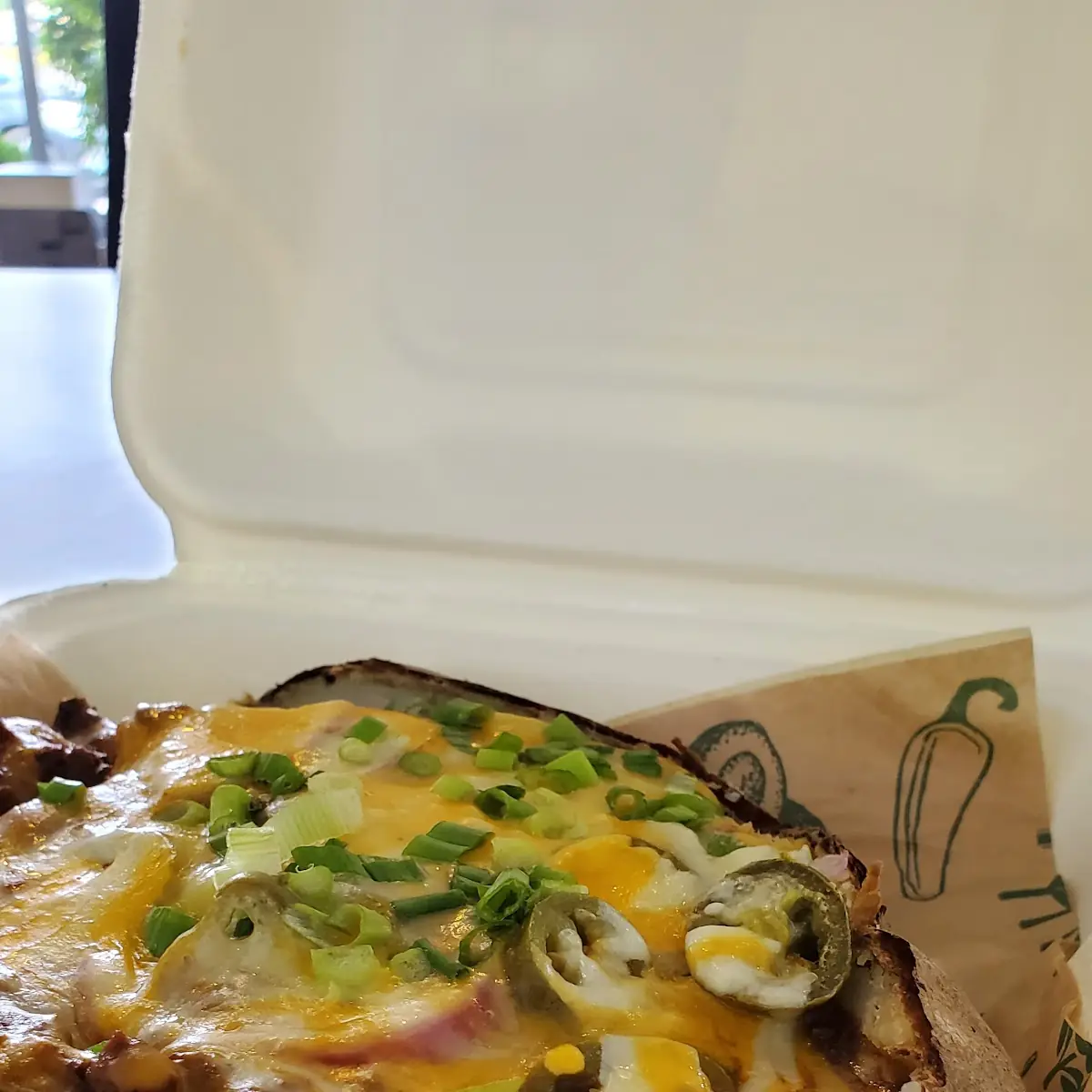 Black Angus Roast Beef Spud with Caramelized Onions Cheddar-Jack and Au Jus
