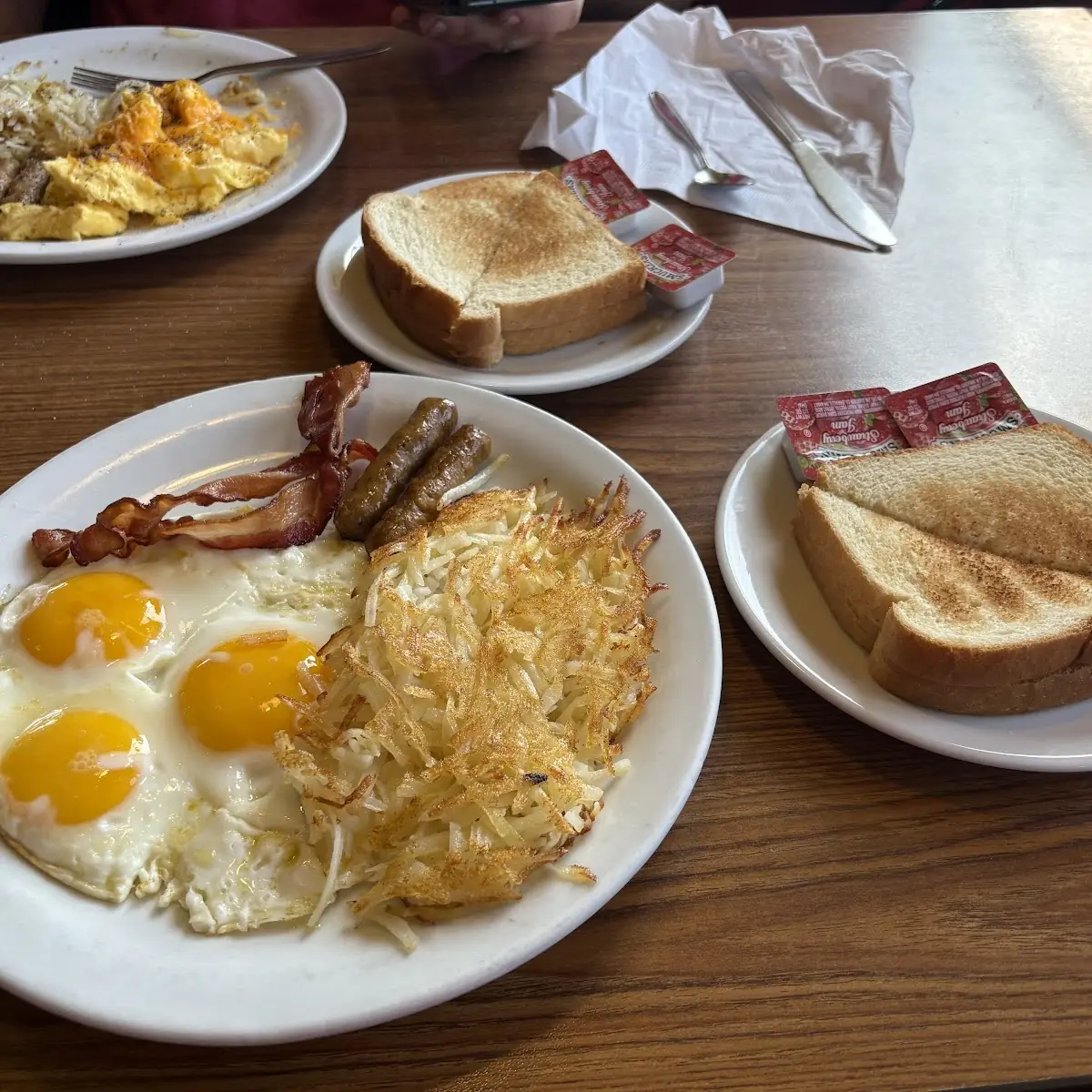 Scrambled Eggs with Hash Browns Side of Pancakes