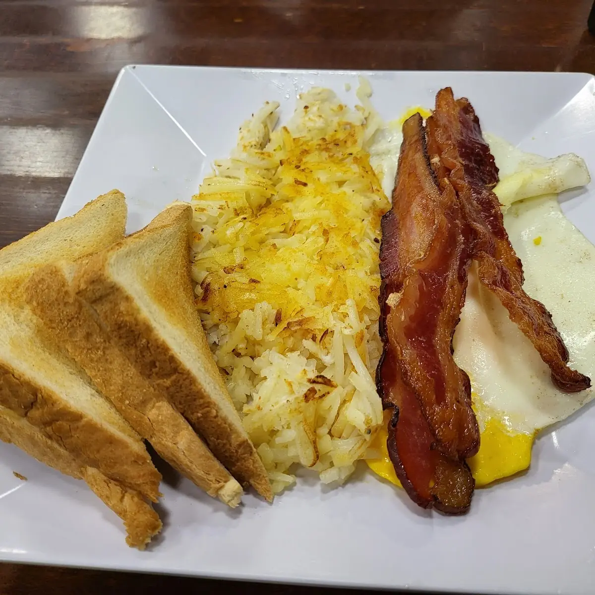 Oaded Scrambled Eggs w Hash Browns and Toast