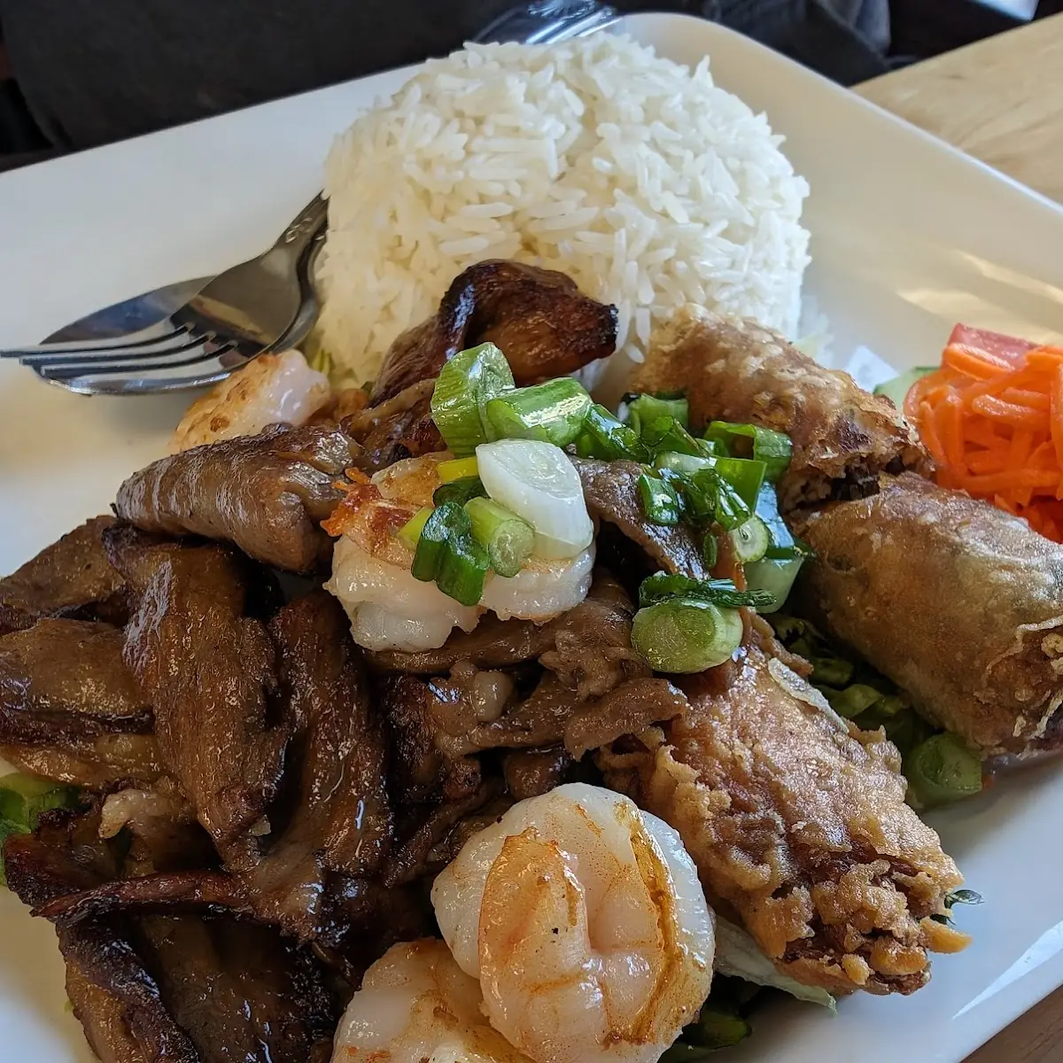 Grilled Pork and Egg Rolls over Rice