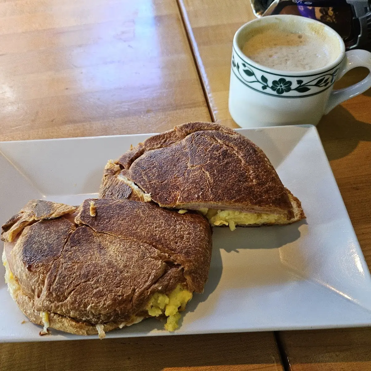 Ham Egg and Cheese on a Pressed Croissant Sandwich