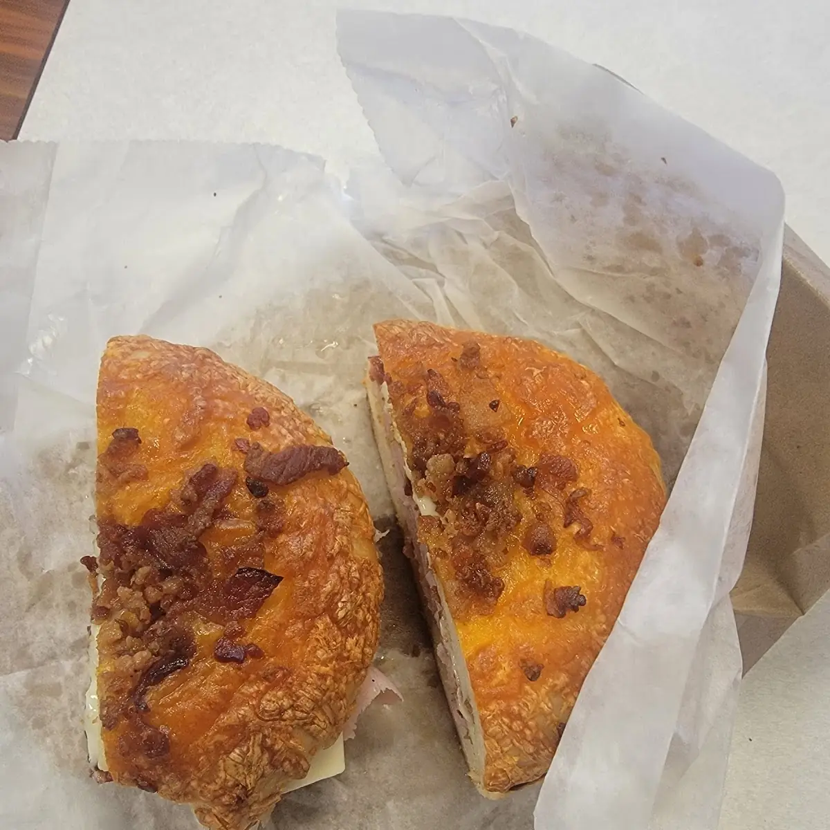 Bacon Cheddar Bagel with Ham Egg N Cheese