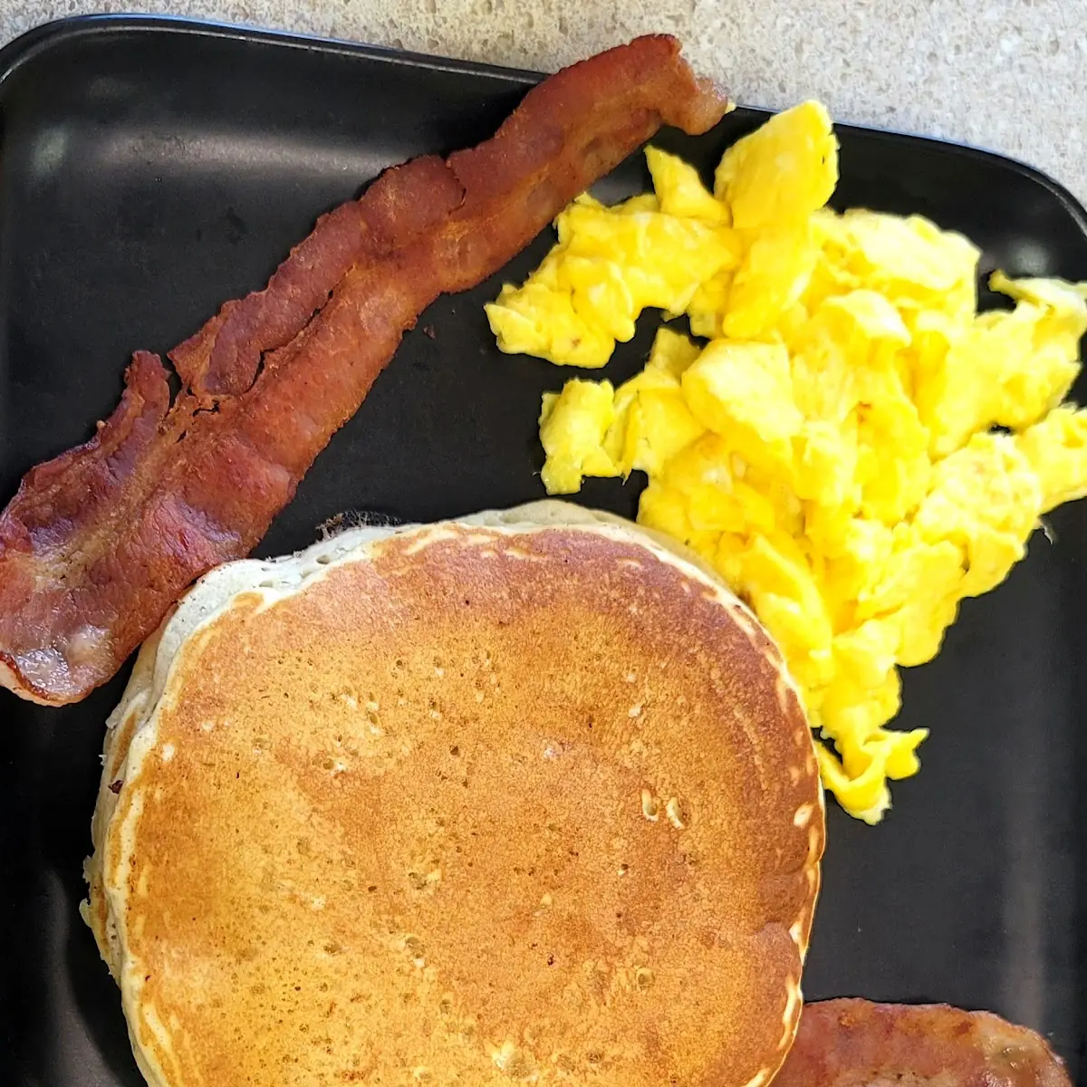 Scrambled Eggs with Bacon and Pancakes