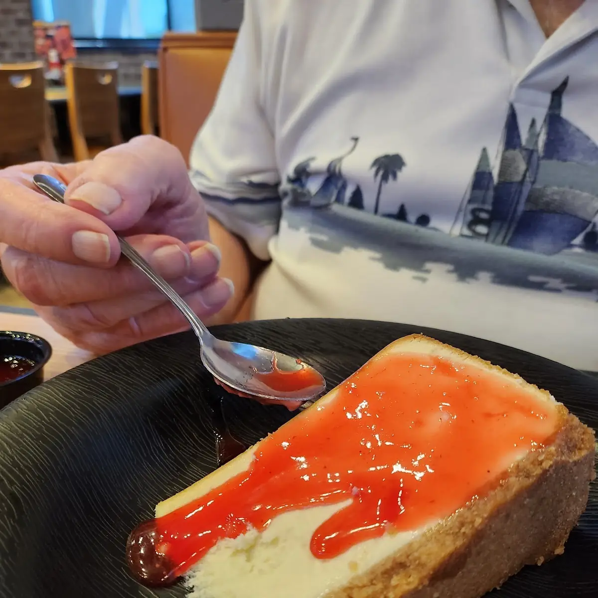 Cheesecake Slice with Strawberry Sauce