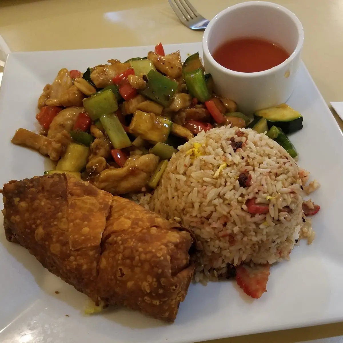 Kung Pao Chicken with Fried Rice and Egg Rolls