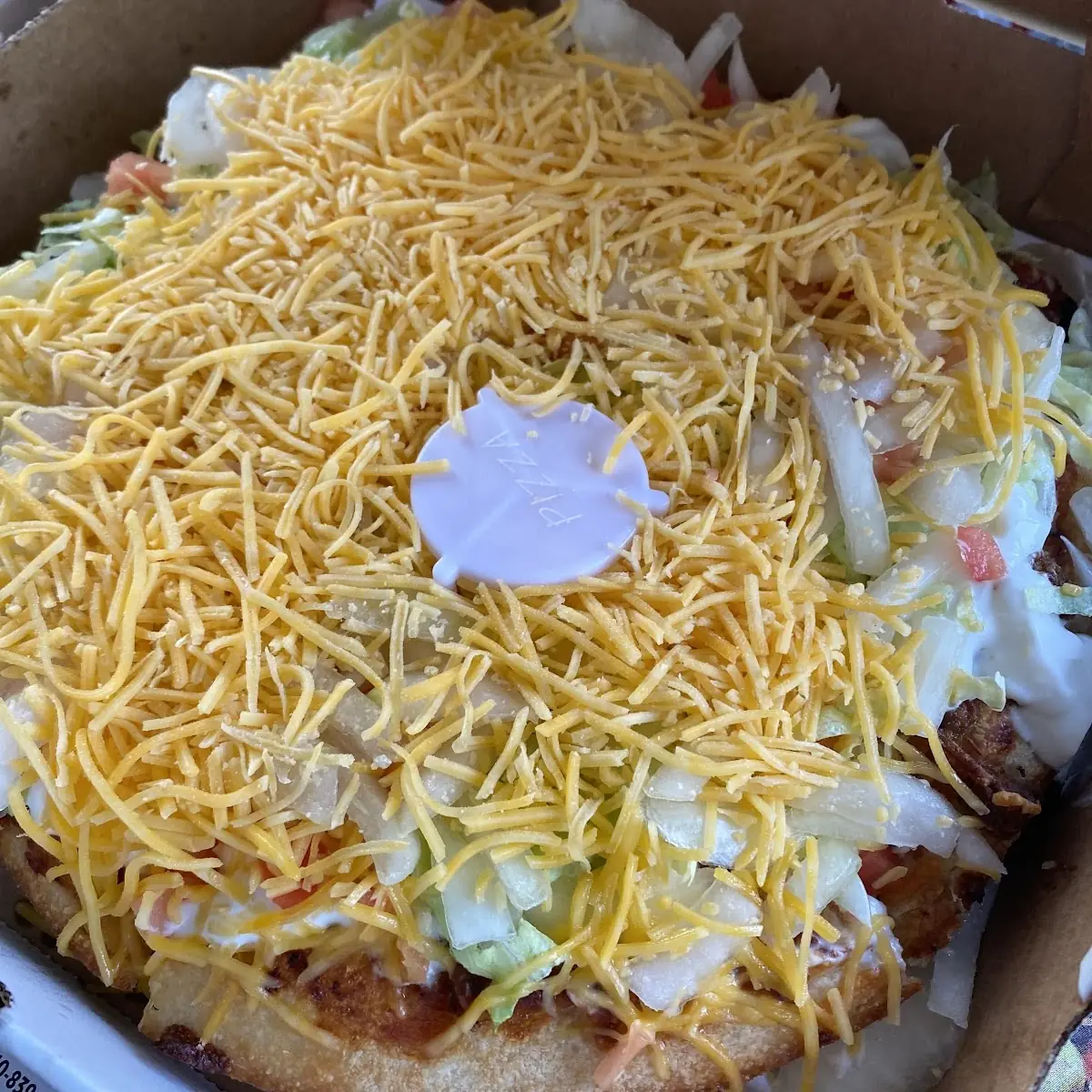Taco Pizza with Extra Cheese and Onions