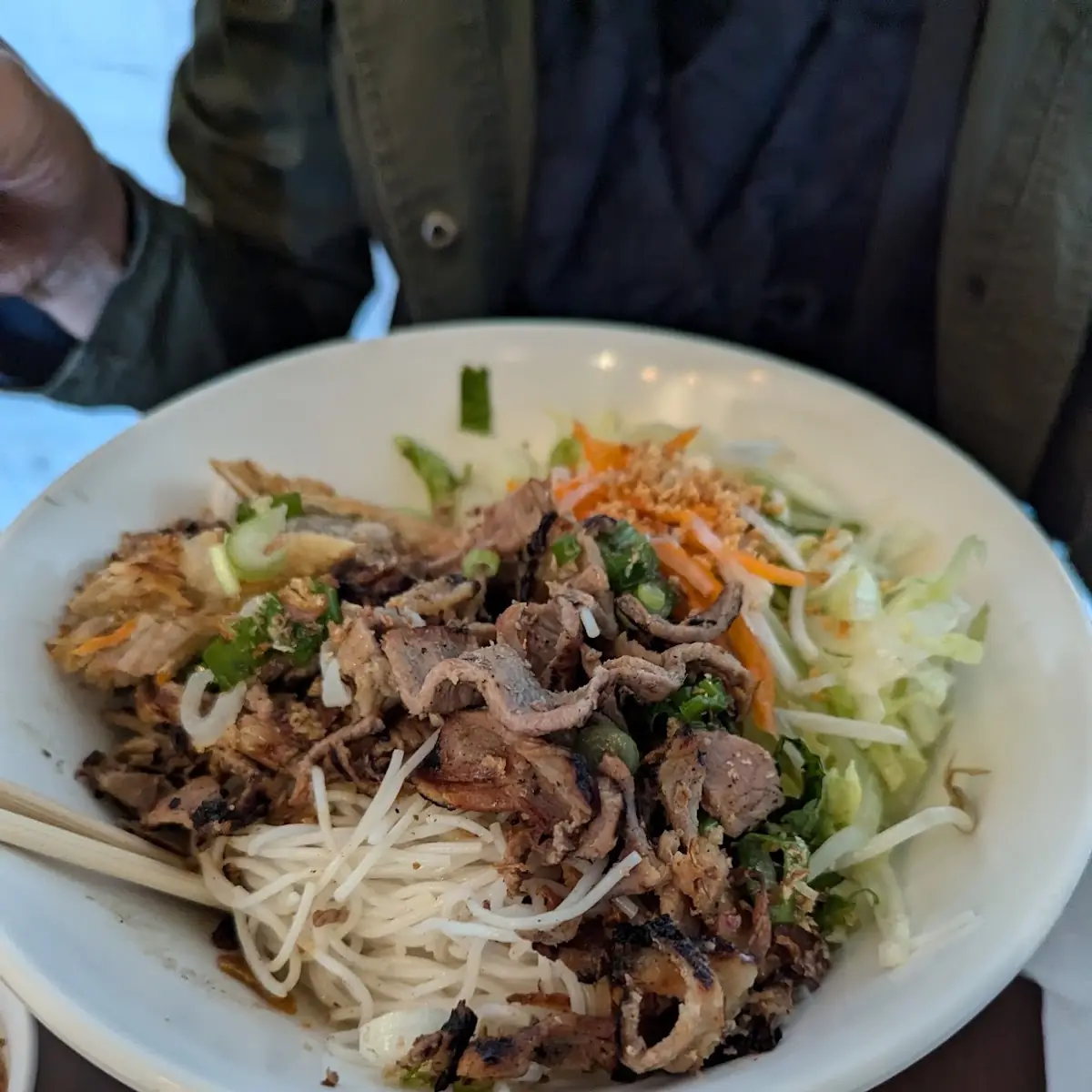 Bun with Pork and 1 Egg Roll 14 50