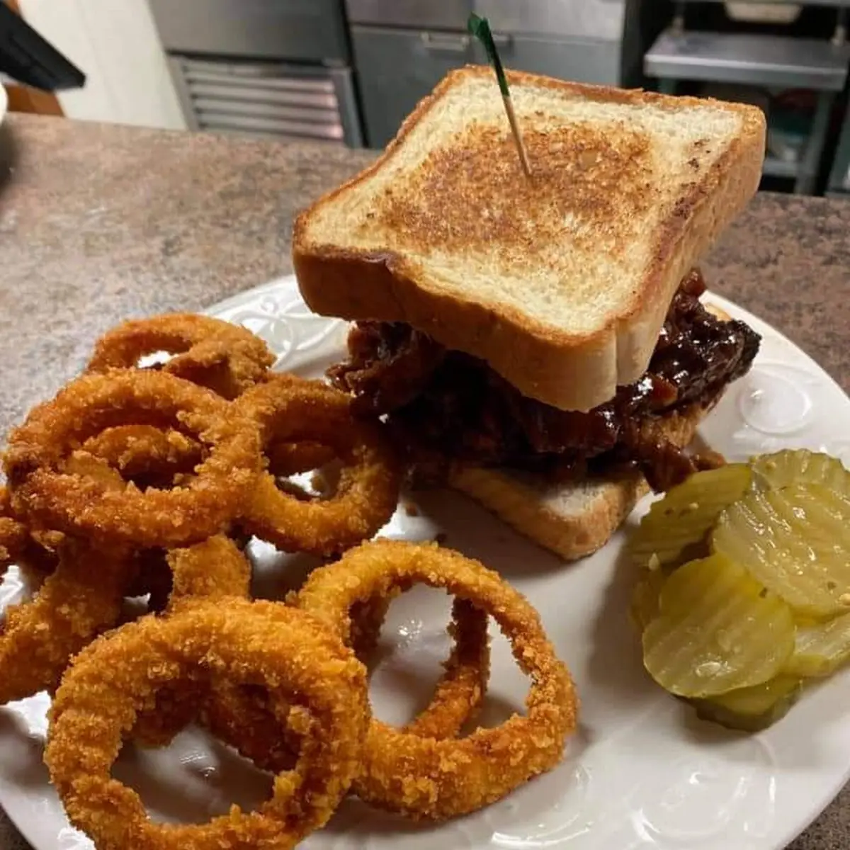 BBQ Pulled Pork Sandwich and Onion Rings