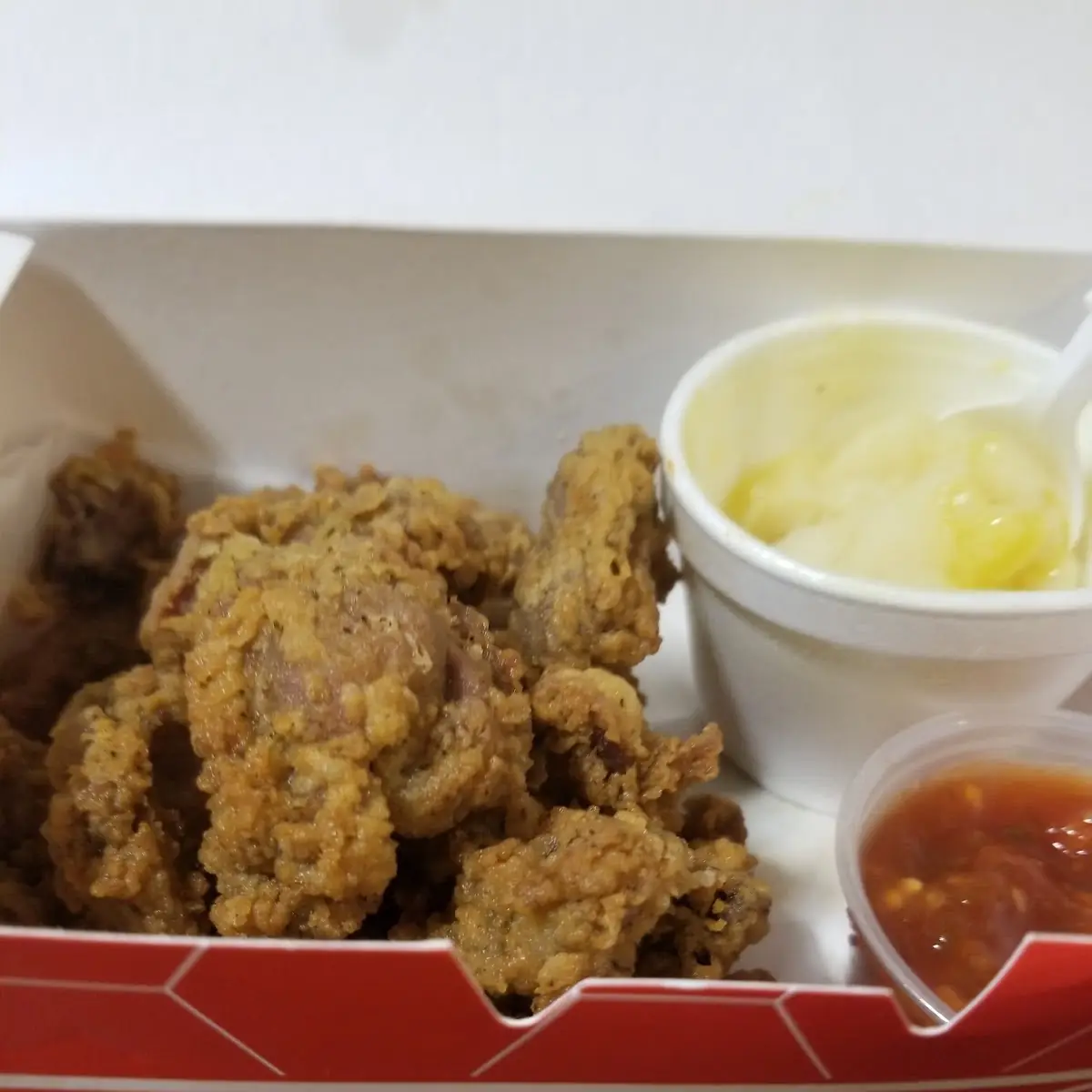 1 2 Order of Fried Gizzards Mashed Potatoes with Gravy Hot Sauce Roll