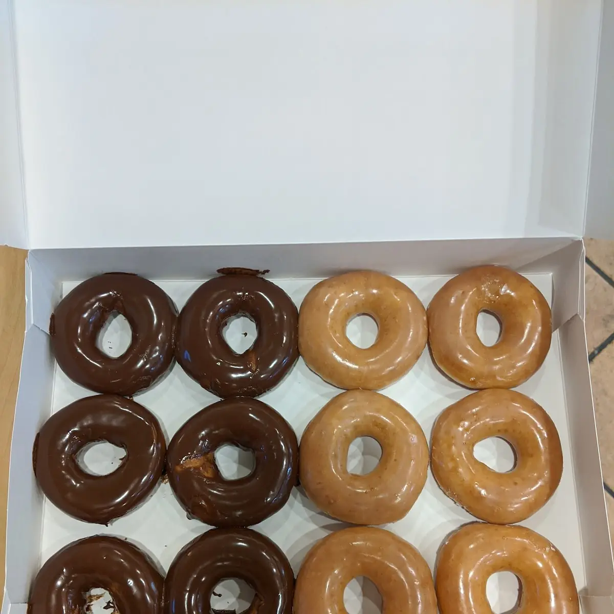 Half Chocolate Half Original Glazed Donuts