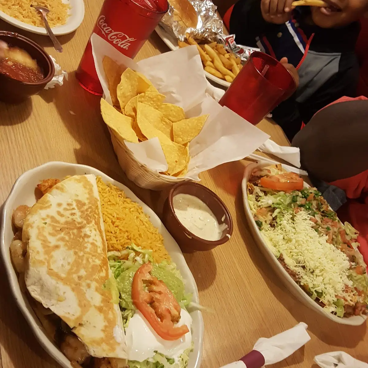 7. Choice of Burrito, Taco, Enchilada or Quesadilla with French Fries