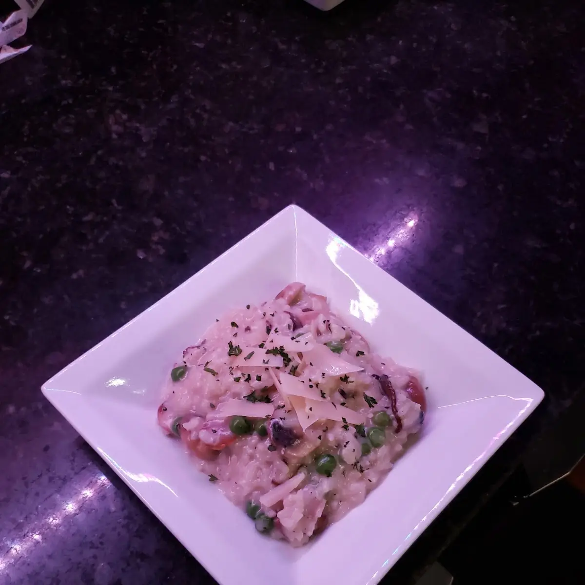 Wild Mushroom Risotto with Prosciutto and Peas