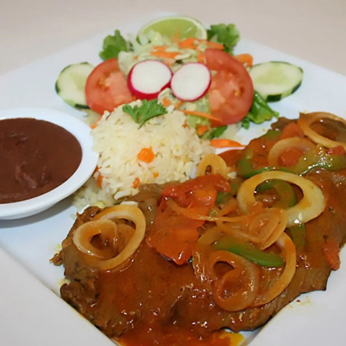Bistec Encebollado