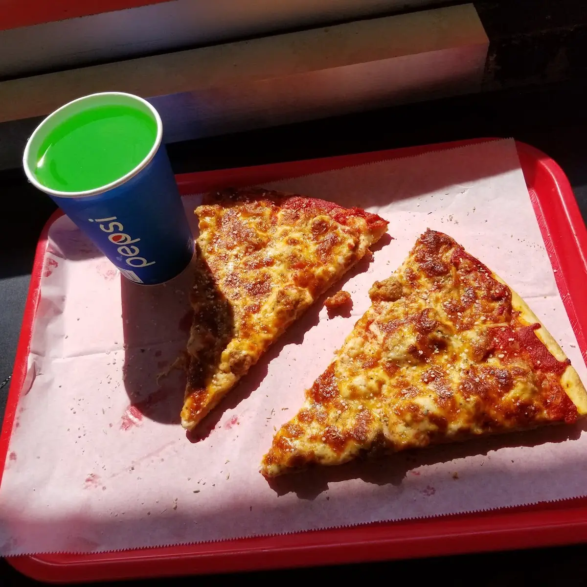 Pizza Slice and a Green River Drink