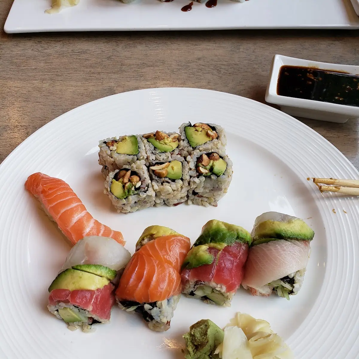 Rainbow Roll and Avocado Peanut Roll with Salmon Sushi