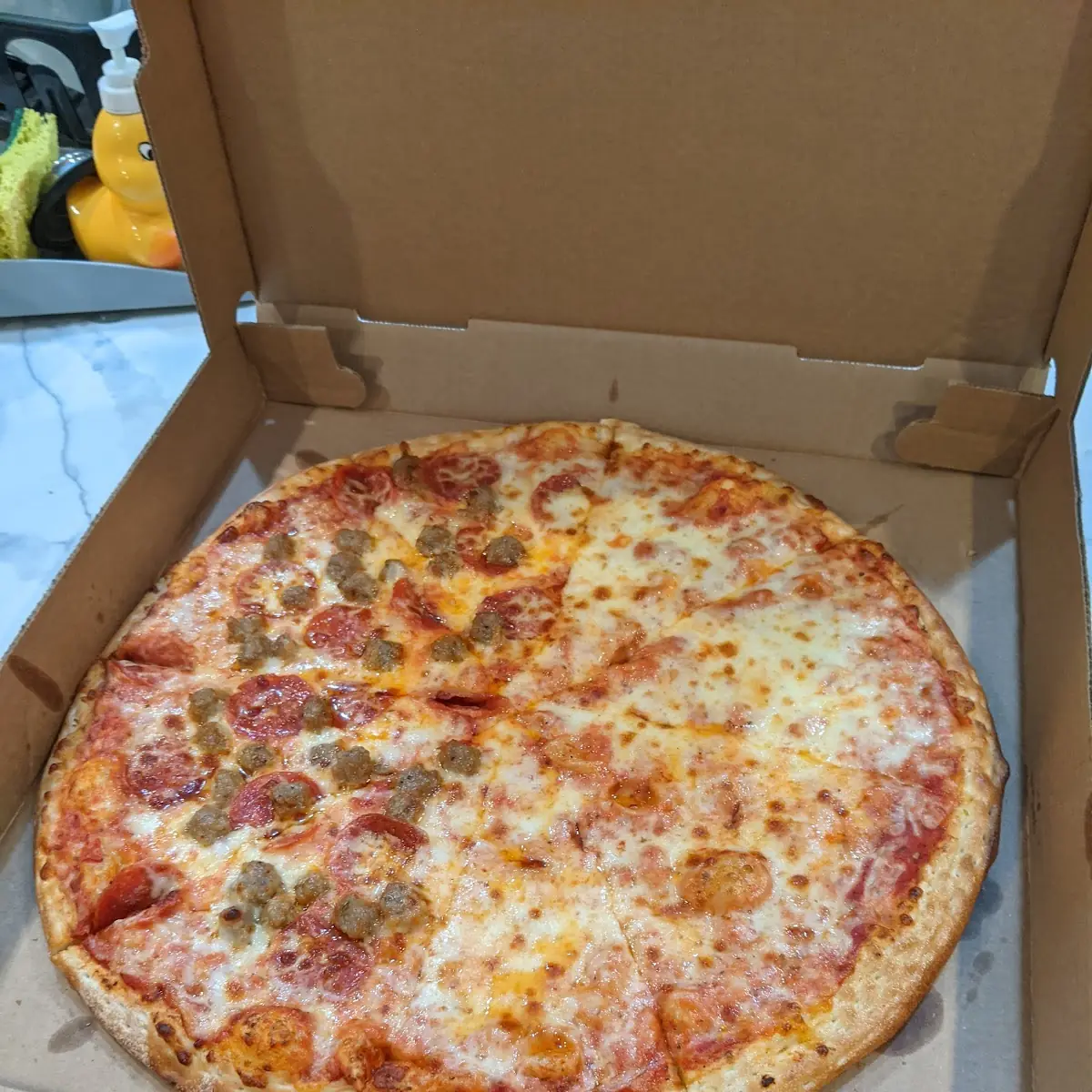 Half Cheese Half Pepperoni and Sausage Pizza