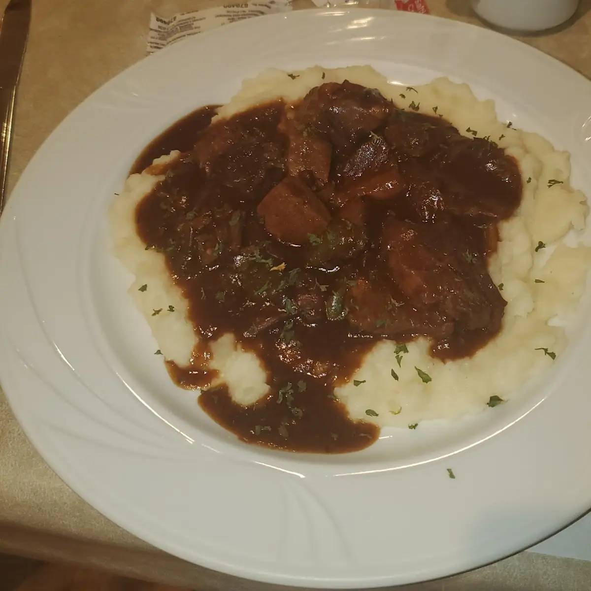 Beef Tips over Mashed Potatoes