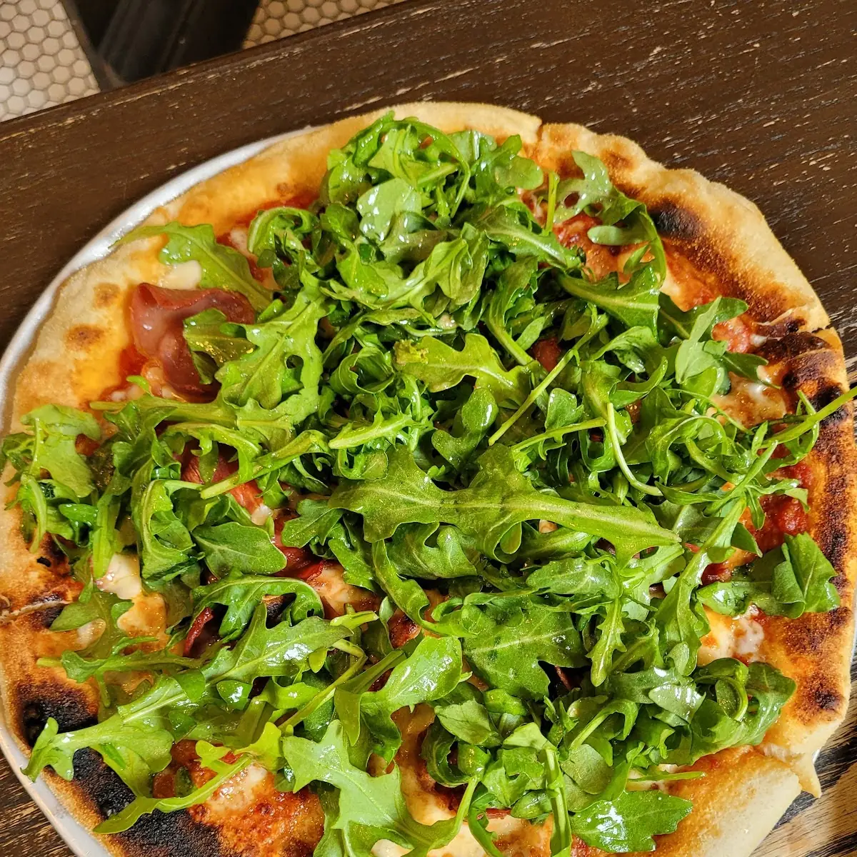 Arugula with Shaved Parmigiano & Pine Nuts