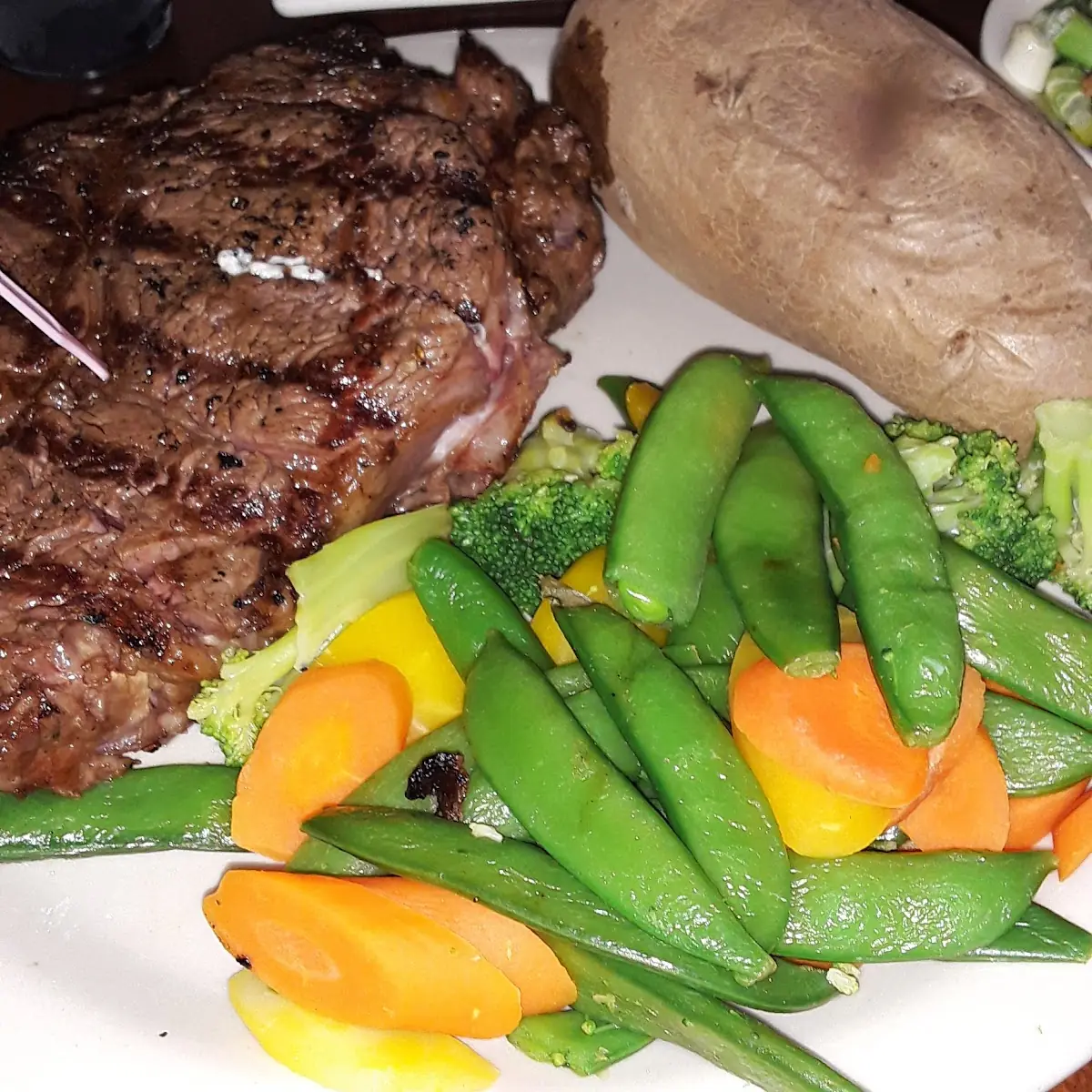 Ribeye Steak Steamed Vegetables & a Baked Potato