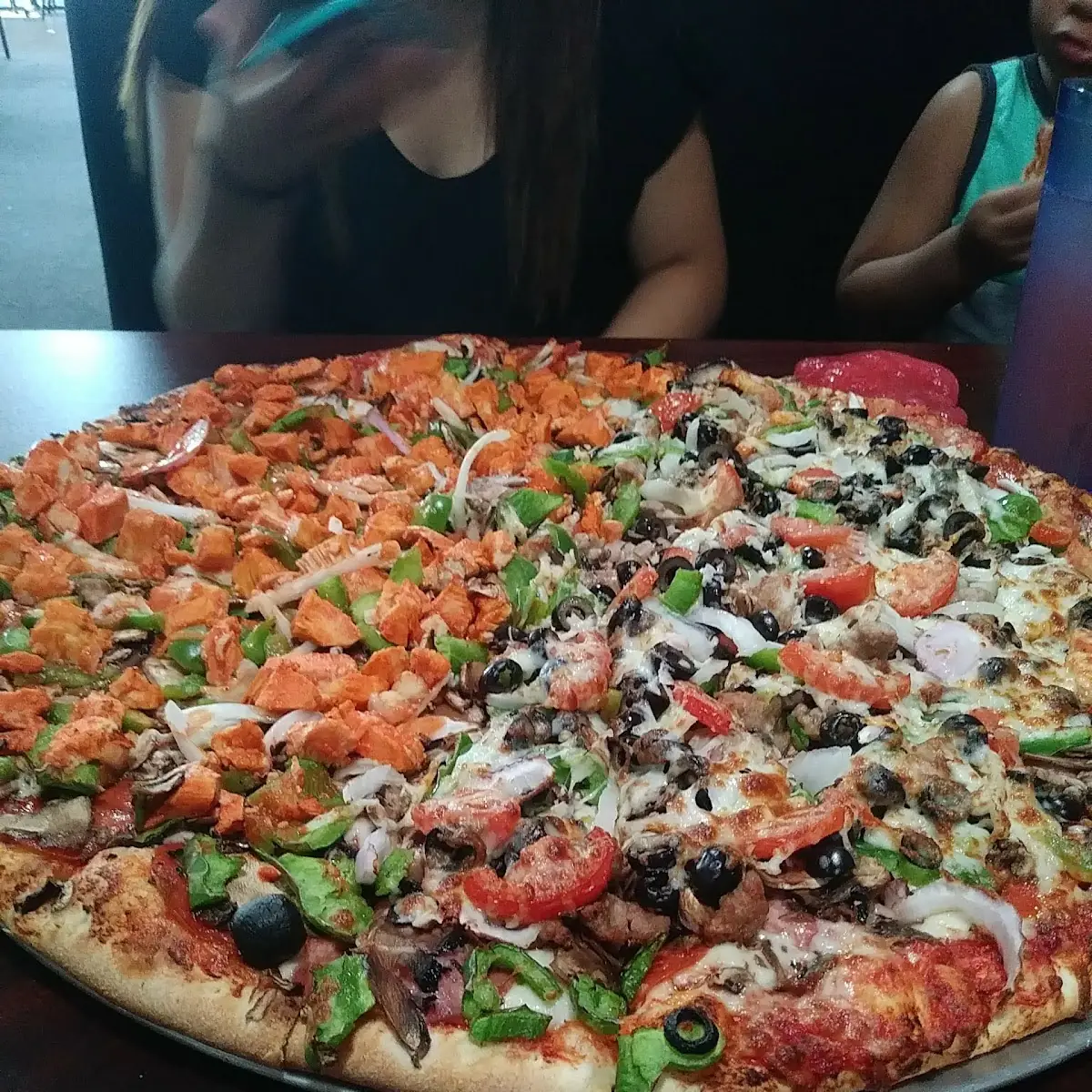 Half Buffalo Chicken Half Supreme Pizza