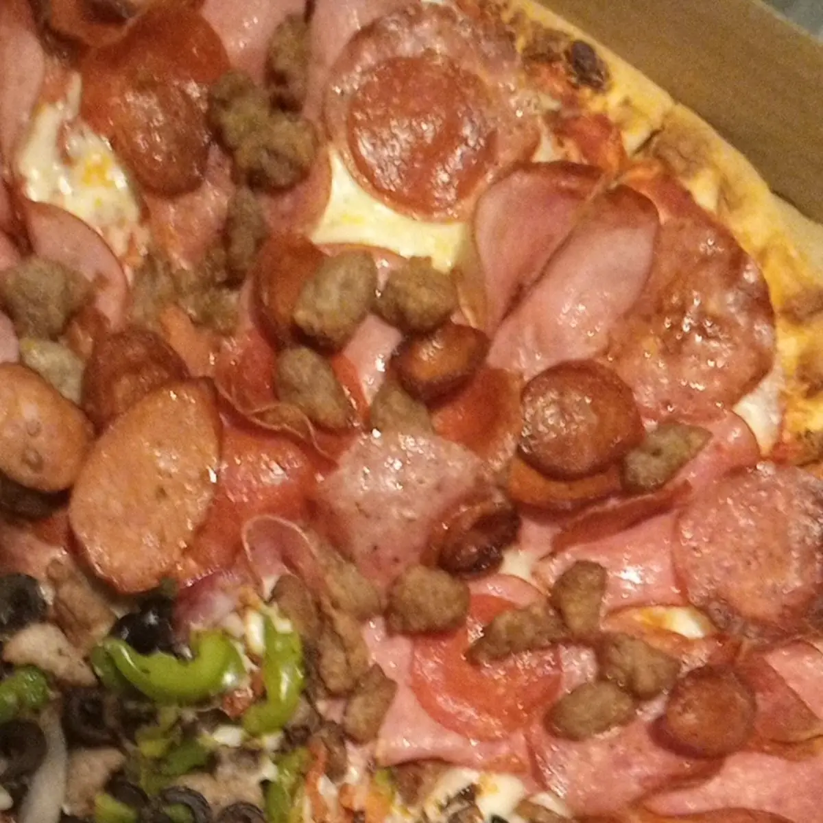 Half Meat Lovers Half Supreme Pizza