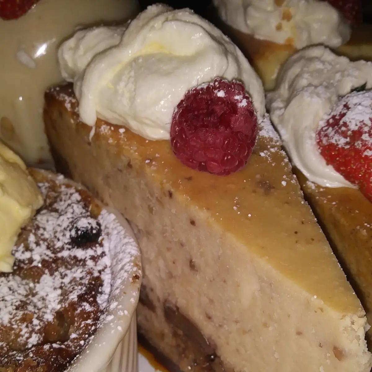 Praline Bread Pudding Soufflé with Vanilla Ice Cream & Bourbon Sauce