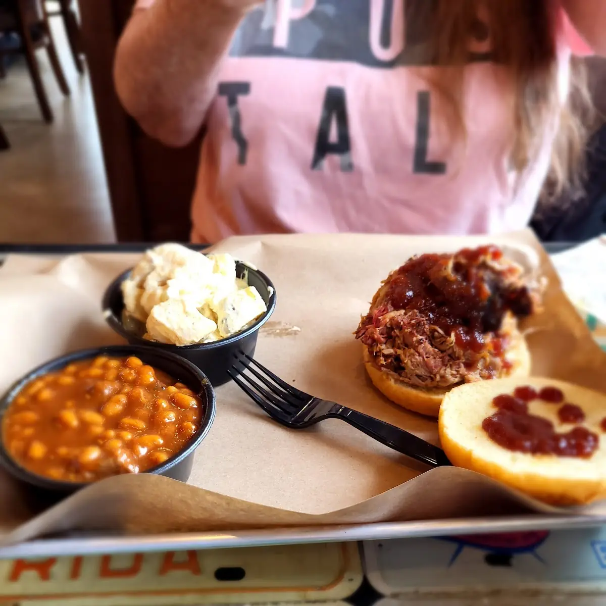 Pulled Pork Sandwich with Beans and Potato Salad