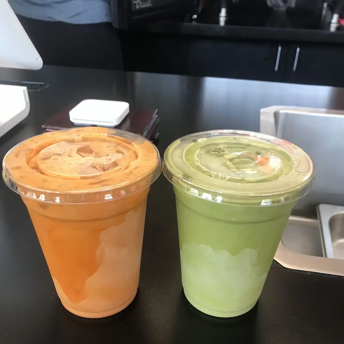 Iced Thai Tea Left Iced Green Thai Tea Right