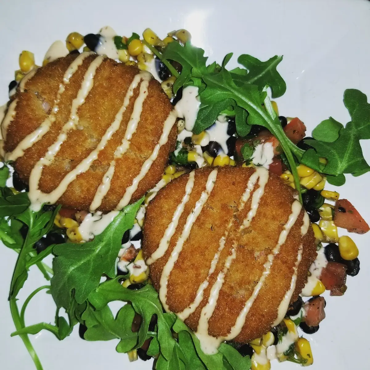 Crab Cakes Arugula and Spicy Aioli