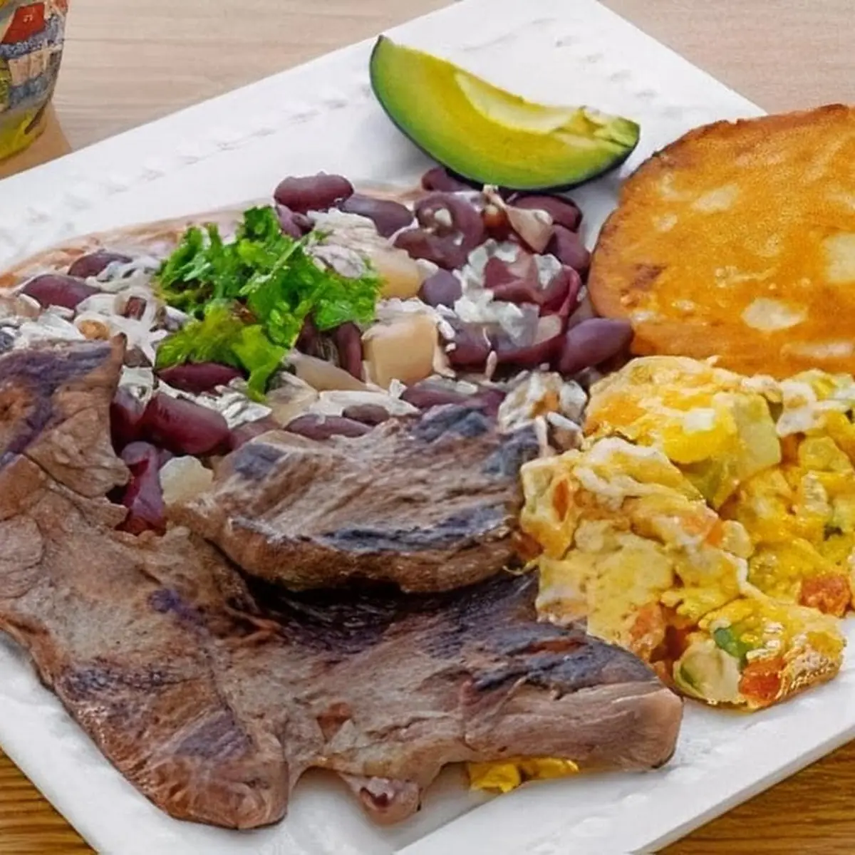 Steak with Eggs Rice Beans and Arepa