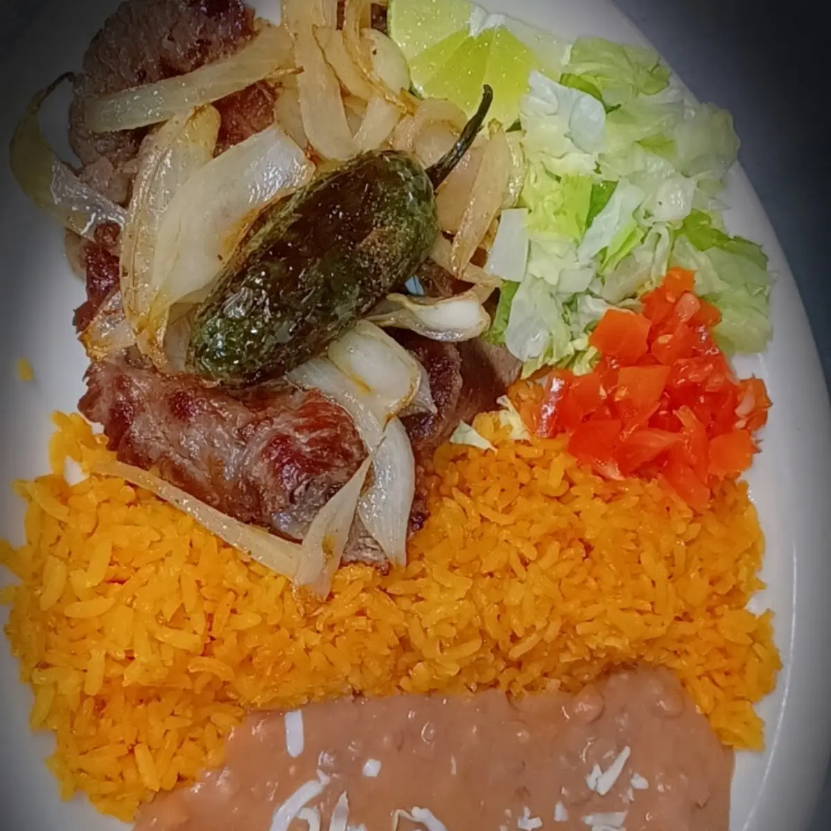 Bistec Encebollado