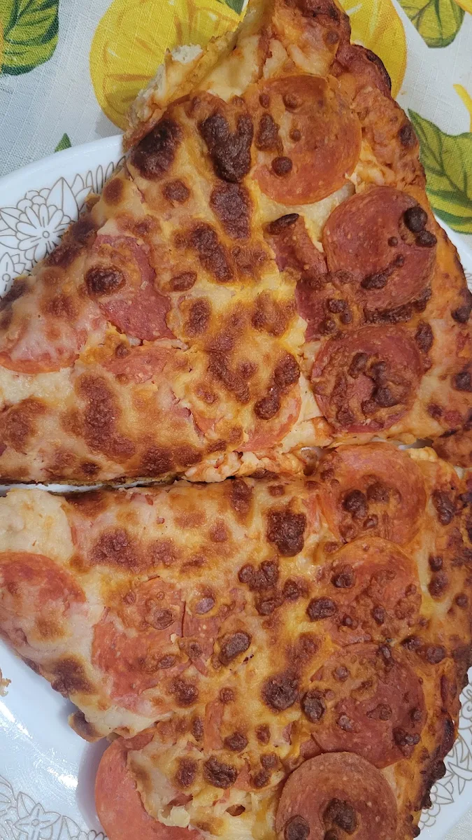 Large Pepperoni Pizza over Baked from Choo Choos