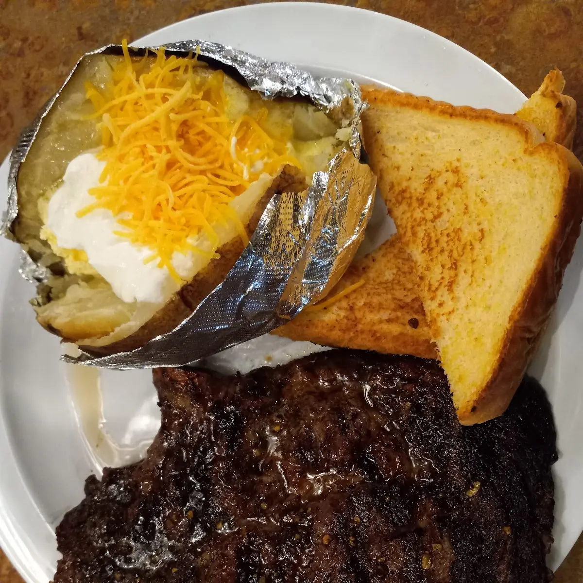 Bone in Ribeye with Baked Potato