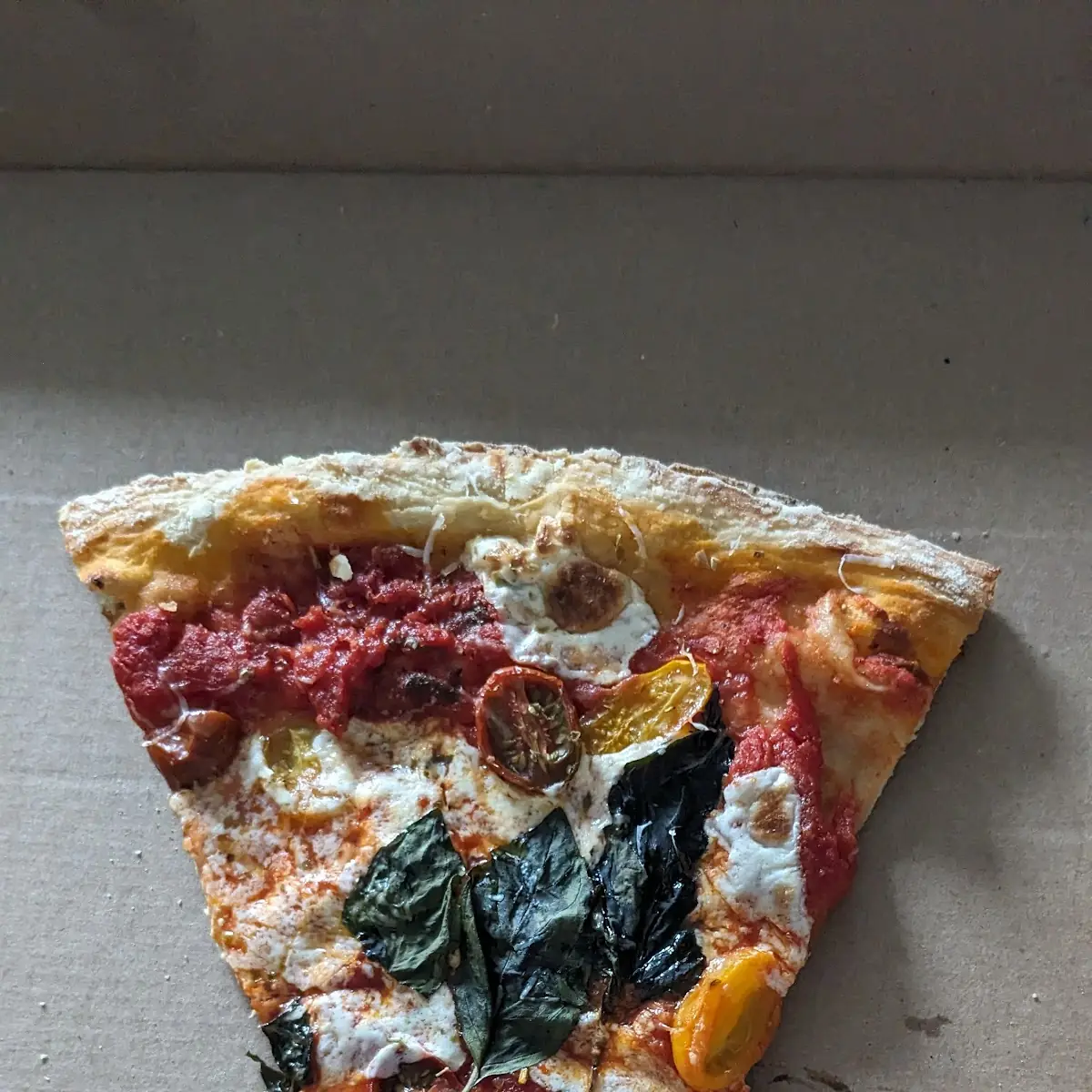 Slice of Margherita Pizza
