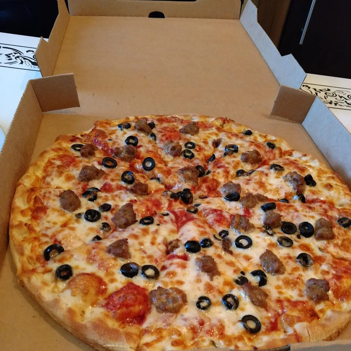 Sausage and Black Olive Pizza