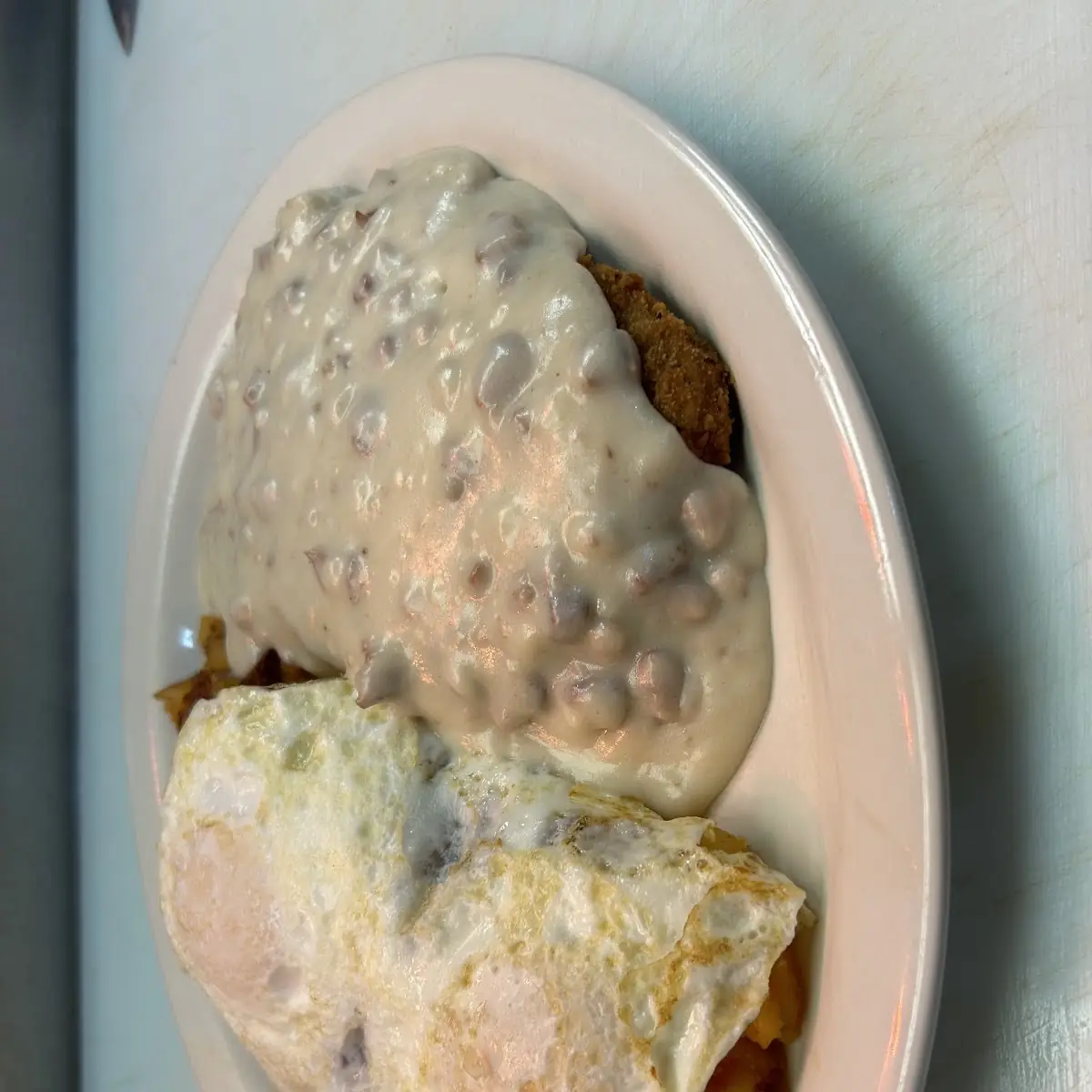 Sausage Gravy over Biscuits