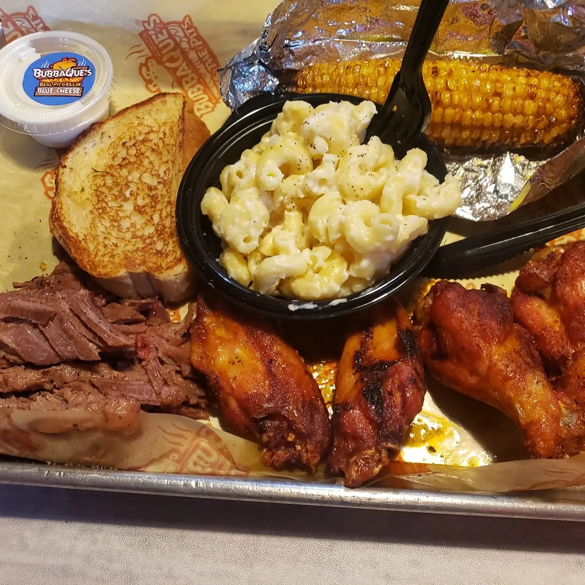 Beef Brisket and Wings Mac and Cheese and Fried Corn