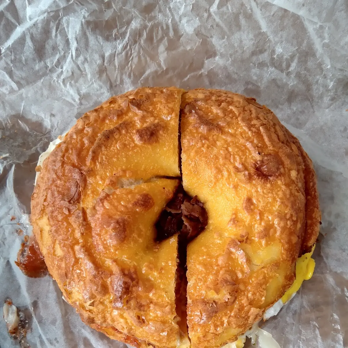 Double Cheddar Bagel with Pastrami Egg and Pepper Jack Cheese spt and 1 Cold Tomato Perfection