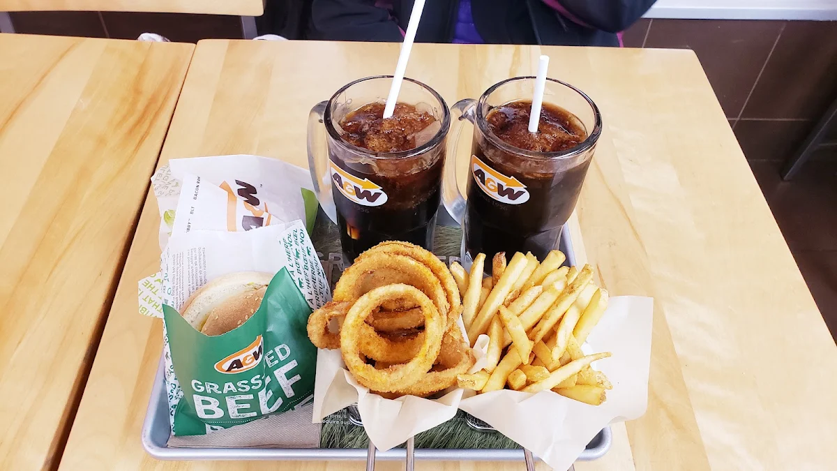 Habenero Crispy Chicken Sandwich French Fries Onion Rings and Root Beers