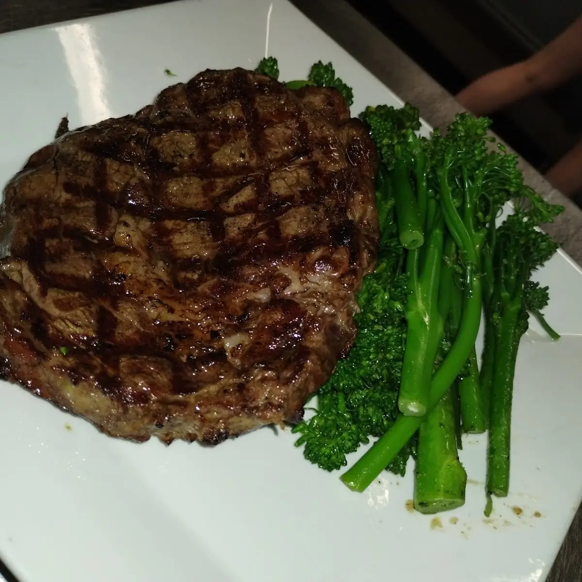 Medium Rare Ribeye over Broccolini