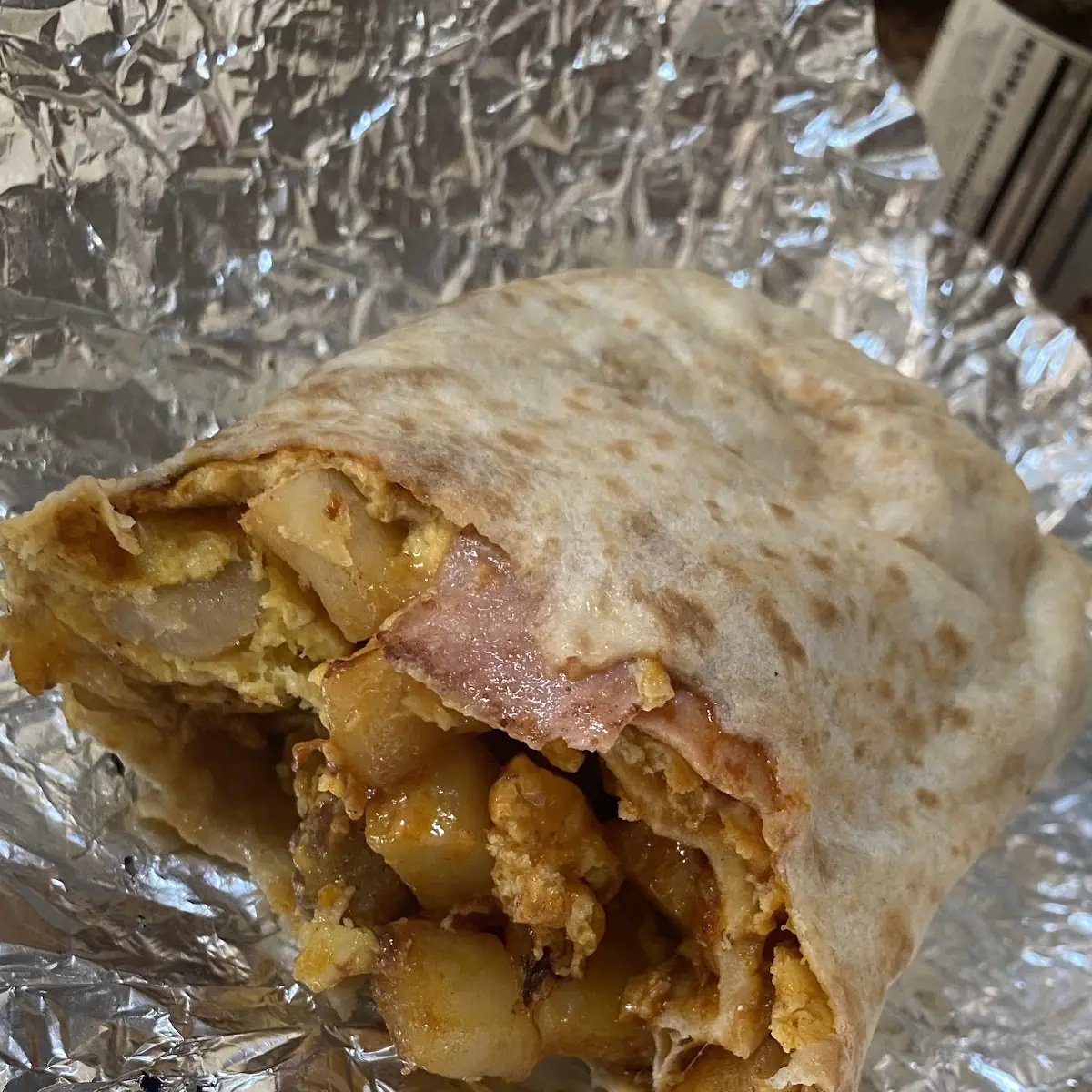 Ham Bacon Sausage Cheese Eggs Potatoes Burrito