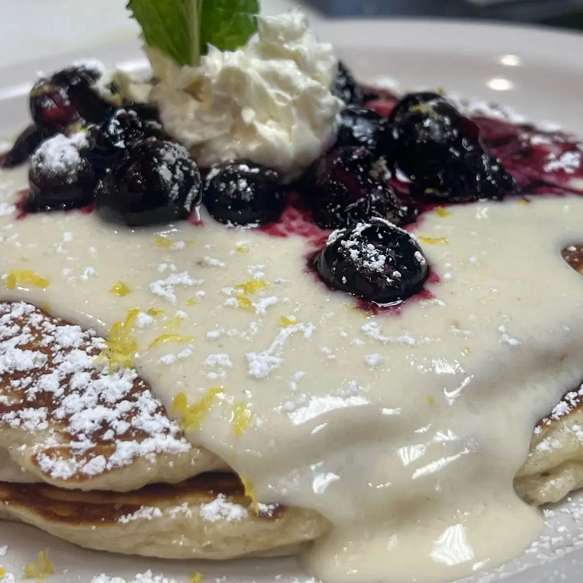 Blueberry Pancakes with Cream and Sugar