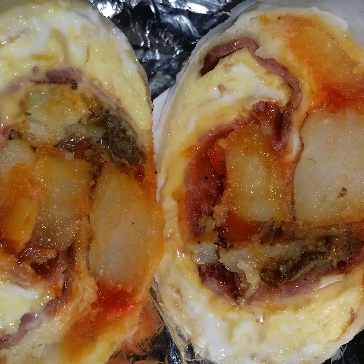 Eggs Cheese Turkey Bacon and Home Fries Wrap