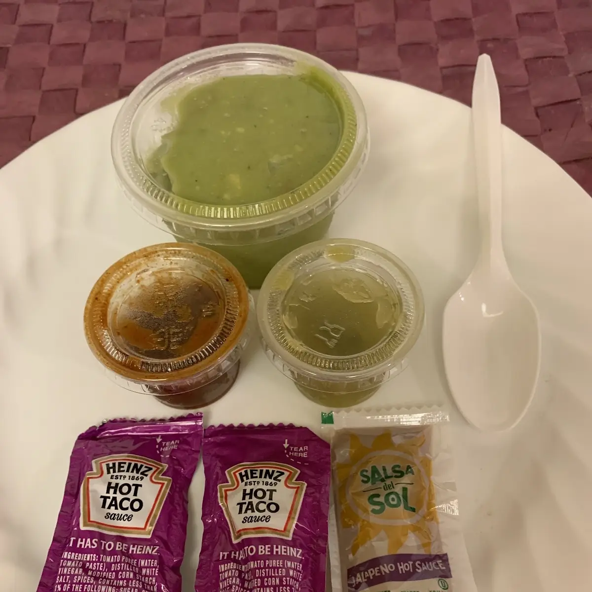 Condiments Guacamole and Hot Sauce