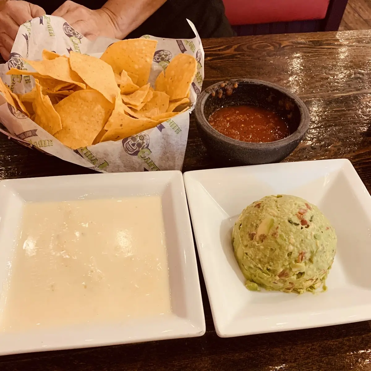 Large Queso Dip and Large Guacamole Dip