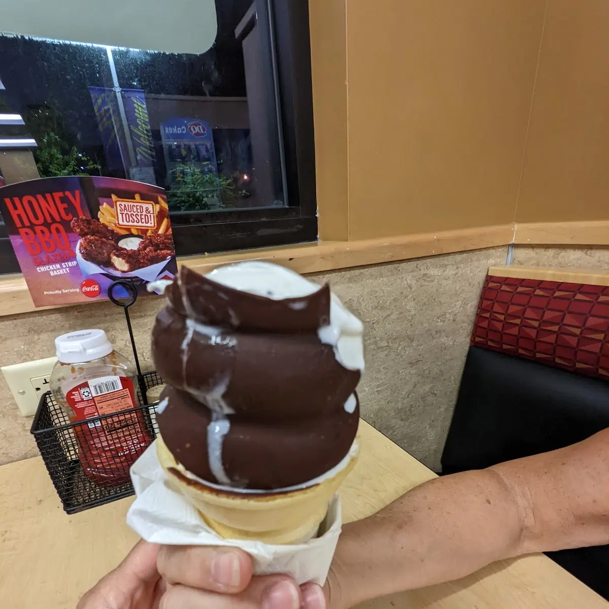 Vanilla Soft Serve Dipped in Chocolate on a Cone