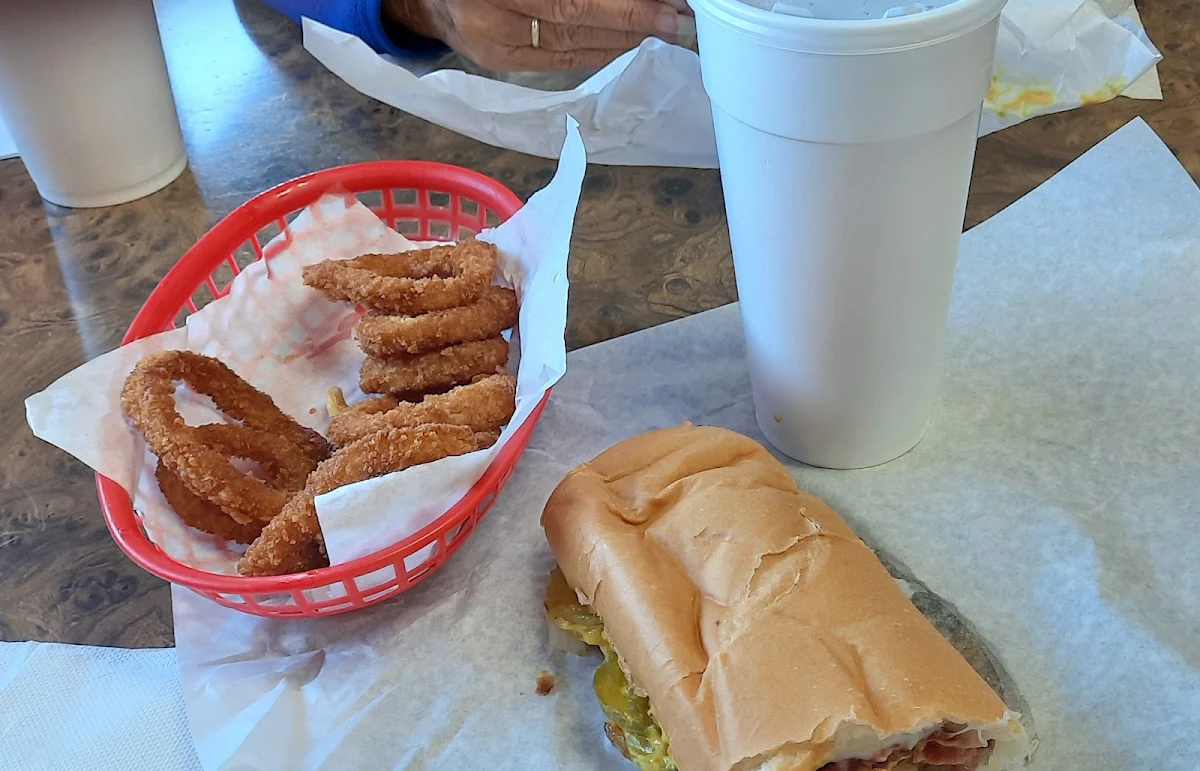 Pastrami Sandwich and Onion Rings