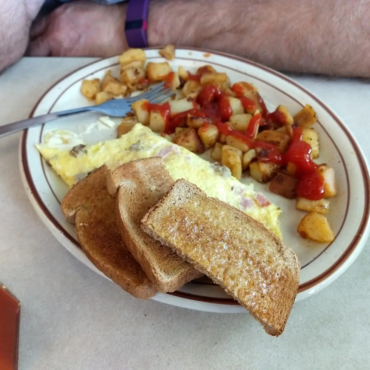 Meat Lover's Omelet with Home Fries